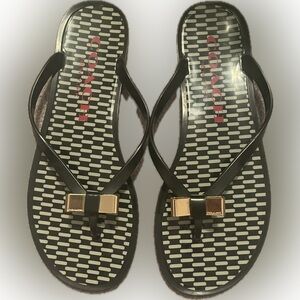 Coach Black and Gold Sandals with Elegant Bow Design